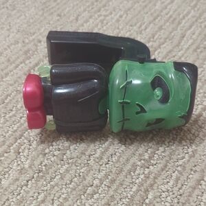 Green and Black Monster Toy